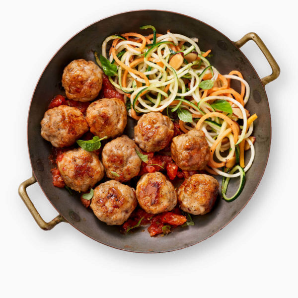 Chicken Meatballs cooking in a skillet